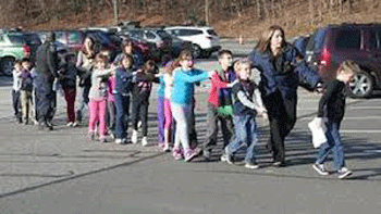 Newtown entierra a sus víctimas