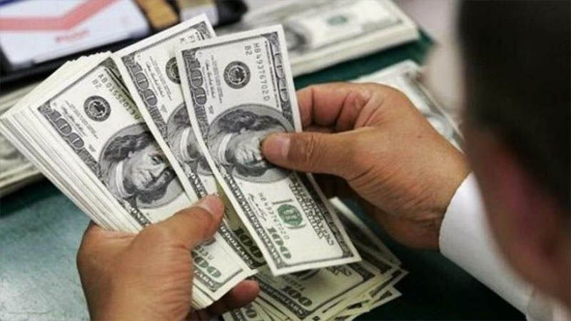 Argentina limita compra de d&oacute;lares para frenar crisis econ&oacute;mica.