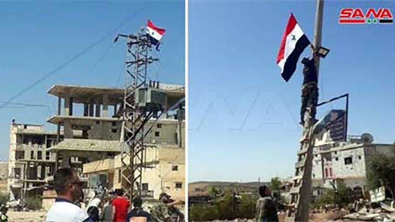 Ej&eacute;rcito sirio vuelve a izar la bandera nacional en Daraa al-Balad